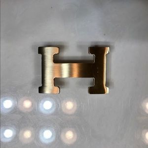H belt buckle